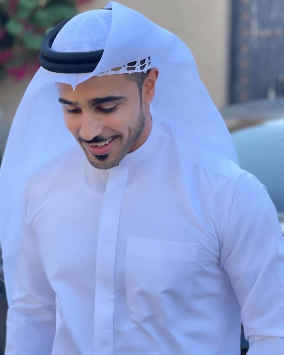 Malik Hassan - Photo 3